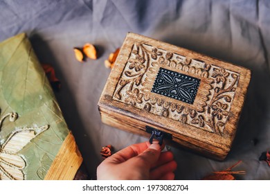 Wood On Brown Tablecloth, Embroidered, Vintage And Elegant Box, Dried Orange Leaves, Decoration