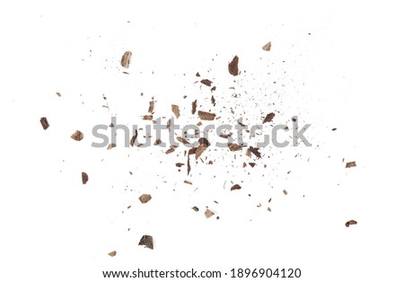 Wood pieces and dust, crushed tree bark isolated on white background, organic texture, top view