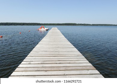 Wood Pier Pontoon On The Lake