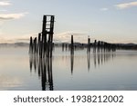 Wood pilings in the Pend Oreille RIver in October in Cusick, Washington.