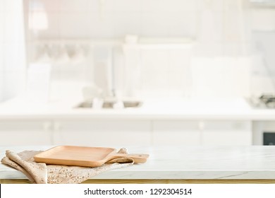 Wood Plate On White Table In Kitchen Room Background And Copy Spce For Productor Food Montage