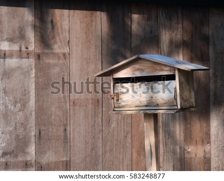 Wood post box with wood door background