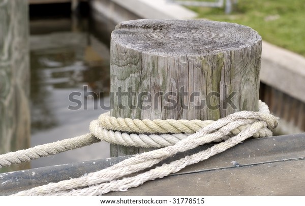 Wood Post Rope Wrapped Around Boat Stock Photo (Edit Now) 31778515