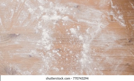 Wood prep table covered with flour.