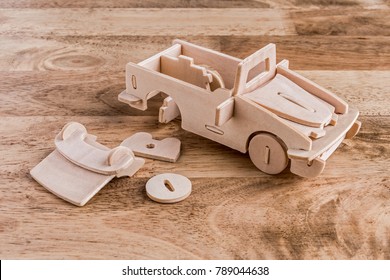 Wood Puzzle Model Car On Wood Table