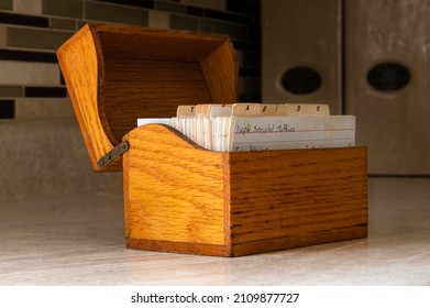 Wood Recipe Box On Kitchen Counter With Hand Written Recipes 