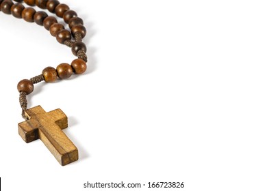 Wood Rosary With Cross At Left Border And Blank Area At Right Side (white Background)