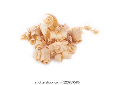Wood shavings, beautifully curled in to a spiral isolated on white
