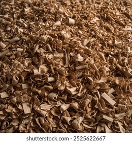 Wood shavings are thin, curly pieces of wood created during woodworking, often used for bedding, mulch, or as packing material due to their absorbency and cushioning properties.