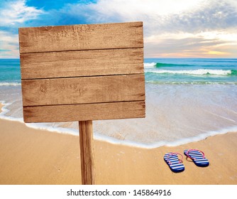 Wood Sign On Beach