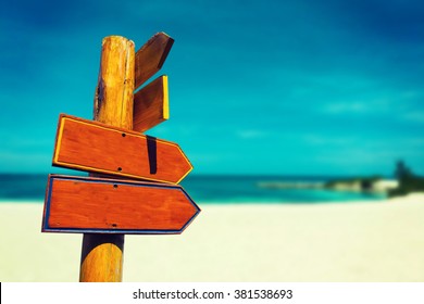 Wood Sign On Beach