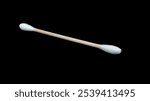 wood stick cotton buds ear buds isolated with black background 