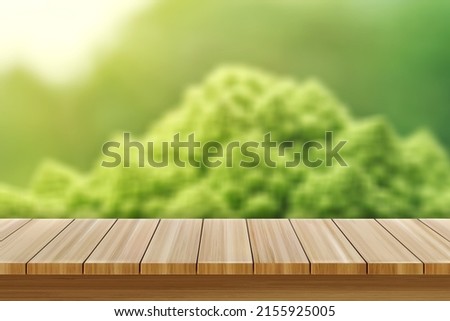 Wood table bar in summer day, and nature background green tree bokeh blurred animated and sun light.