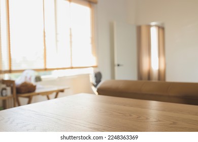wood table and blurry room background