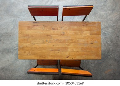 Wood Table With Chair On Retro Old Floor Top View