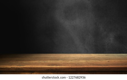 Wood Table On Dark Background.