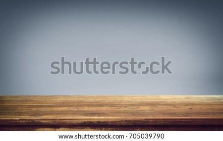 Wood table on gradient background. 