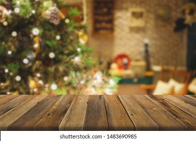 Wood Table Over Christmas Tree With Decoration Blur Background. Can Be Used For Display Or Montage Products.