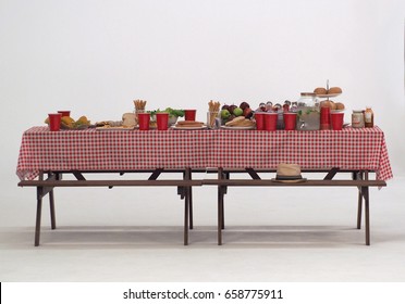 Wood Table And Red Napkin Cover For Outdoor Party Or Picnic In The Garden For Summer Season And White Background In Studio.