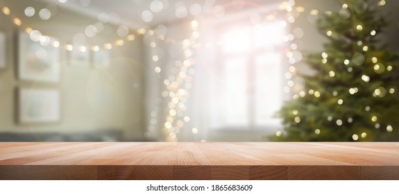 A Wood Table, Tabletop Product Display With A Festive Living Room Christmas Background Of Christmas Tree And Fairy Lights.