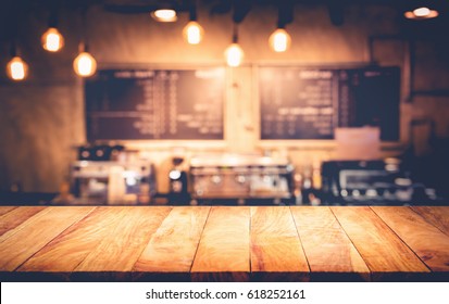 Wood Table Top With Blur Counter Coffee Shop,cafe Background.For Montage Product Display Or Design Key Visual Layout