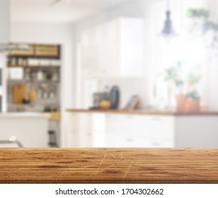 Wood Table Top On Blur Kitchen Counter (room)background.For Montage Product Display Or Design Key Visual Layout.