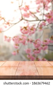 Wood Table Top On Blur Background Of Pink Cherry Blossom Flower, Japan Flower, Sakura.