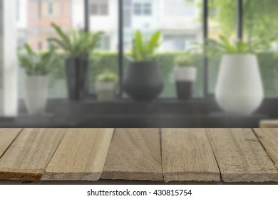 Wood Table Top On Blur Background Of Lobby View - Can Use To Display Or Montage Product