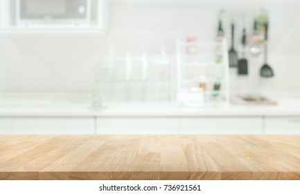 Wood table top on blur kitchen room background .For montage product display or design key visual layout. - Shutterstock ID 736921561