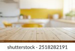 Wood table top on blurred kitchen background. can be used mock up for montage products display or design layout