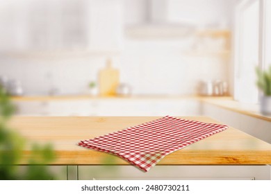 Wood table top on blurred kitchen background. can be used mock up for montage products display or design layout	 - Powered by Shutterstock