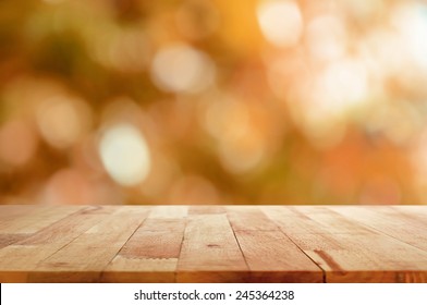 Wood Table Top On Brown Bokeh Abstract Background