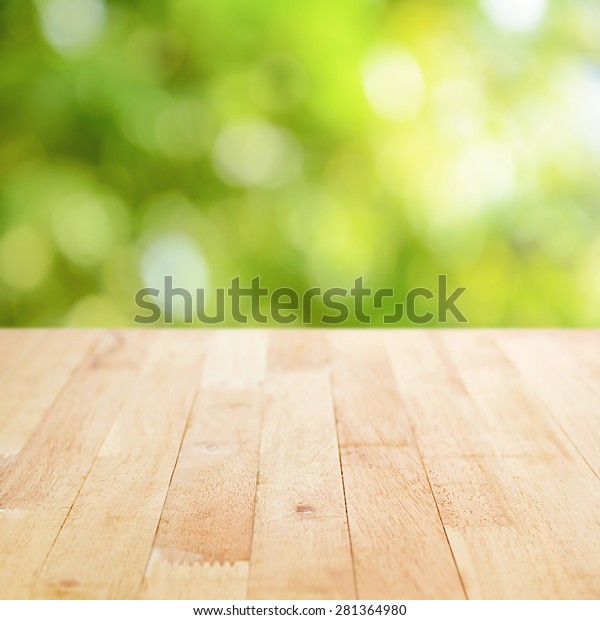 Wood Table Top On Green Bokeh Stock Photo (Edit Now) 281364980