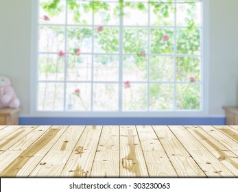 Wood Table Top On Window Interior Room Blurred Background.