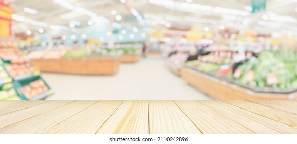 Wood Table Top With Supermarket Grocery Store Blurred Defocused Background With Bokeh Light For Product Display