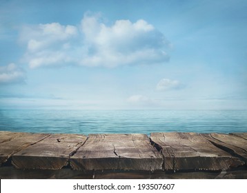 Wood table and tropical landscape in the background.. Spring or summer abstract nature background. - Powered by Shutterstock