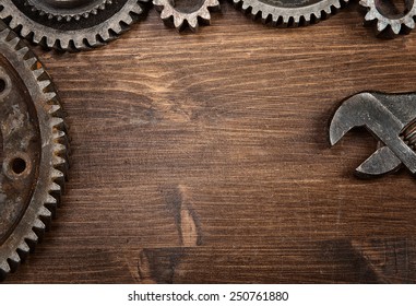 Wood texture background with the gear frame