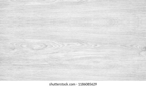 Wood texture background, light gray wooden table with crack and woodgrain. Surface of wood with nature color and pattern. Top view of plywood panel for backdrop or abstract wallpaper.