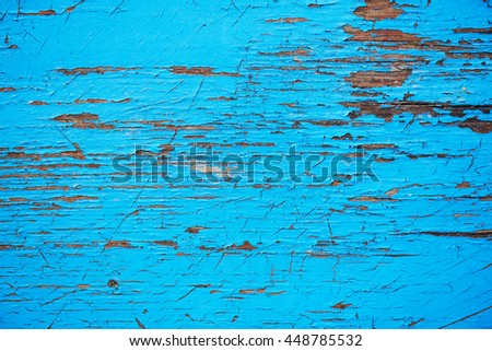 Wood texture with blue flaked paint