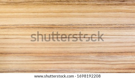 Wood texture. Wood texture for design and decoration. The color is orange-beige with a thin brown stripe. Fine texture, pattern. Natural wood background