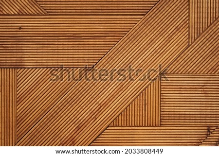 wood texture. fibrous wood texture with geometric patterns. wooden figures stacked in the background. wood background [[stock_photo]] © 
