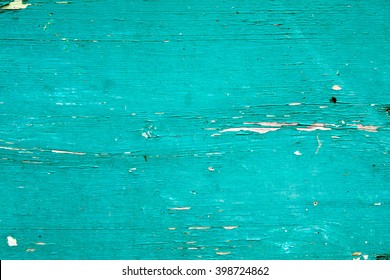 Wood texture with painting color peeled off. Flaking paint - wood background texture.