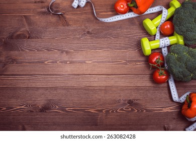 Wood Texture. Simple And Clear Table.desktop. Fitness. Healthy Wood. Green Vegetables. Sport Nutrition. Illustration. Centimeter And Female Light Dumbbell. Top View. Background. 