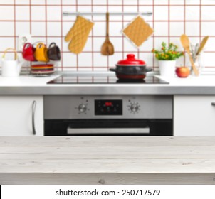 Wood Texture Table On Defocused Kitchen Bench Background