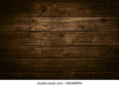 Wood Texture In Warm Golden And Brown Tones. Old Rural Wooden Wall, Detailed Plank Fence Photo Background. Natural Wooden Building Structure.