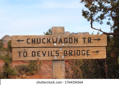 Wood Trail Sign For Chuckwagon Trail And Devil's Bridge Trail In Sedona, Arizona, USA