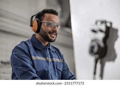 Wood turning mechanic analyze and enter data into computer software to automate and regulate machines involving cut, laser, saw, mill, lathe based on contract requirements and production standards. - Shutterstock ID 2311777173