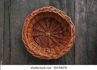 Wood Weave Fruit Basket On Wood Texture, Top View