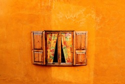 Wood Window On Orange Cement Wall