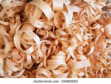 Wood working wood shavings, Slightly muted tone. Shallow depth of field.